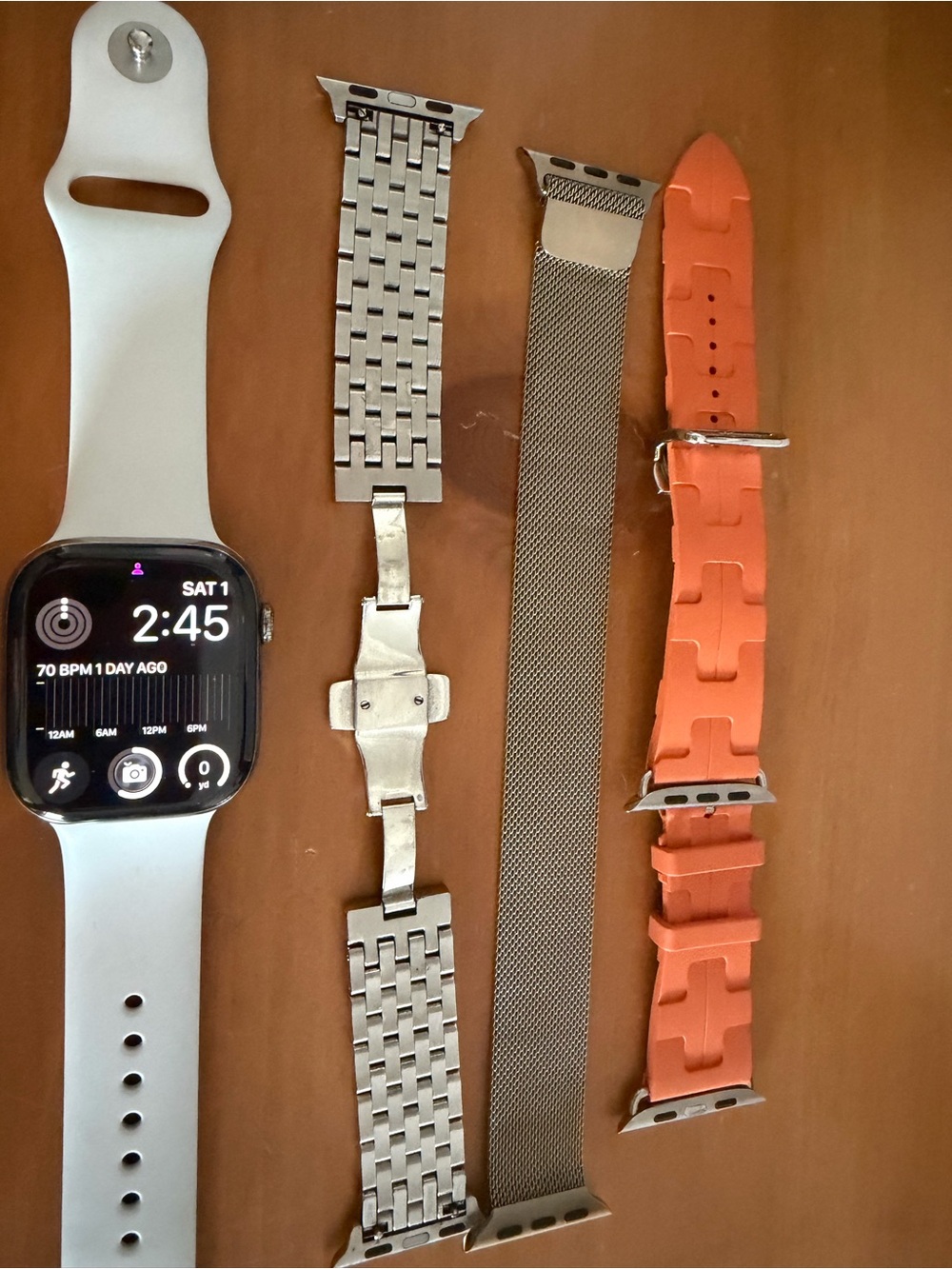 Apple Watch 10 Titanium 46 with three designer straps